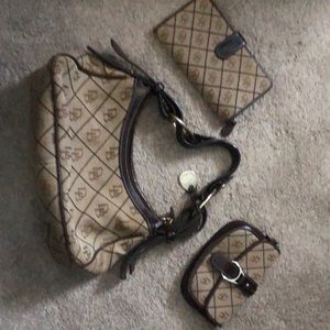 Small bag with clutch and coin purse.  Perfect condition.